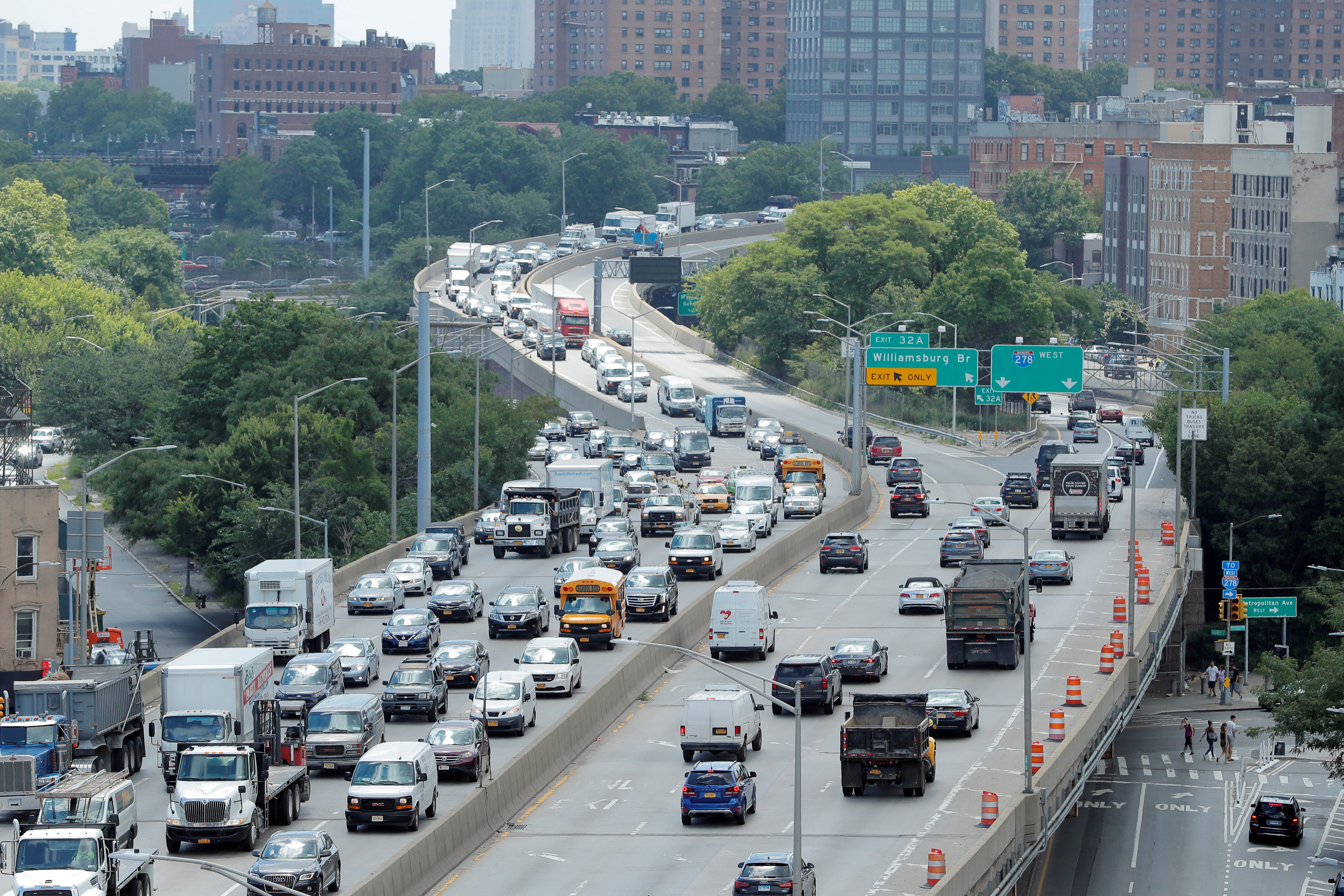 Traffic backs up on the Brooklyn Queens Expressway in New York, Aug. 2, 2018. The U.S. House of Representatives approved a $715 billion surface transportation and water infrastructure bill on Thursday, July 1, 2021.