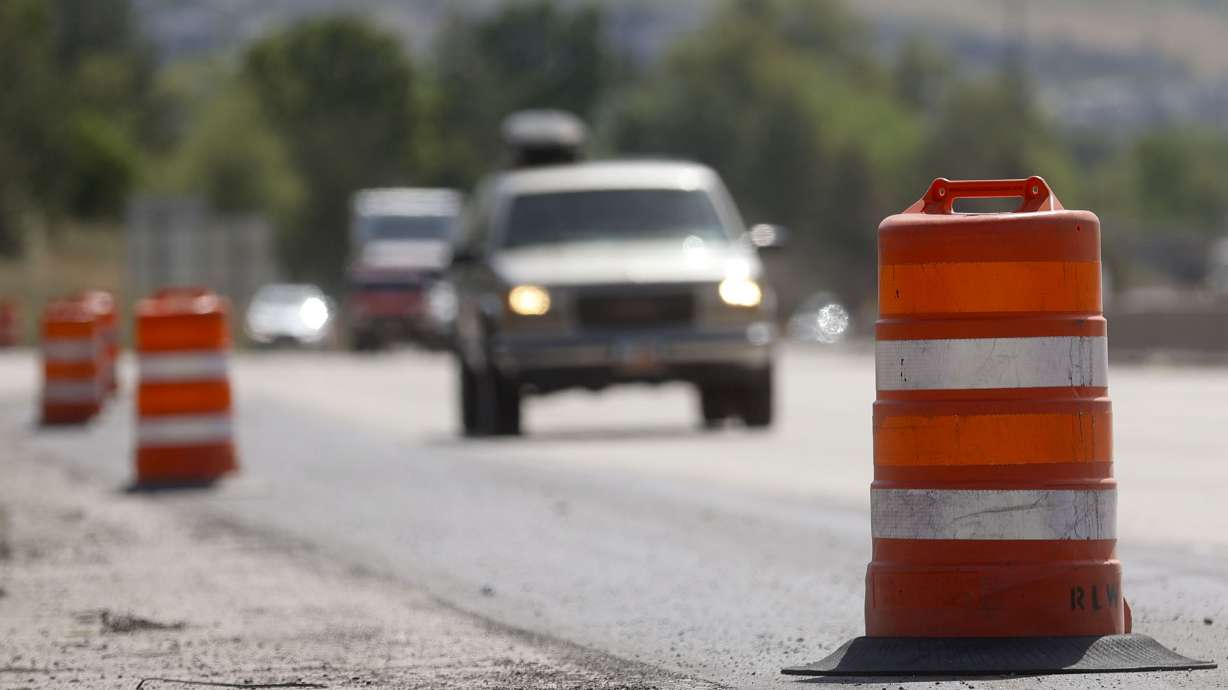 Traffic moves along I-80 near 1300 East in Salt Lake City on Tuesday, June 1, 2021. The Utah Department of Transportation on Thursday informed drivers of possible travel delays throughout the Fourth of July weekend in Utah.