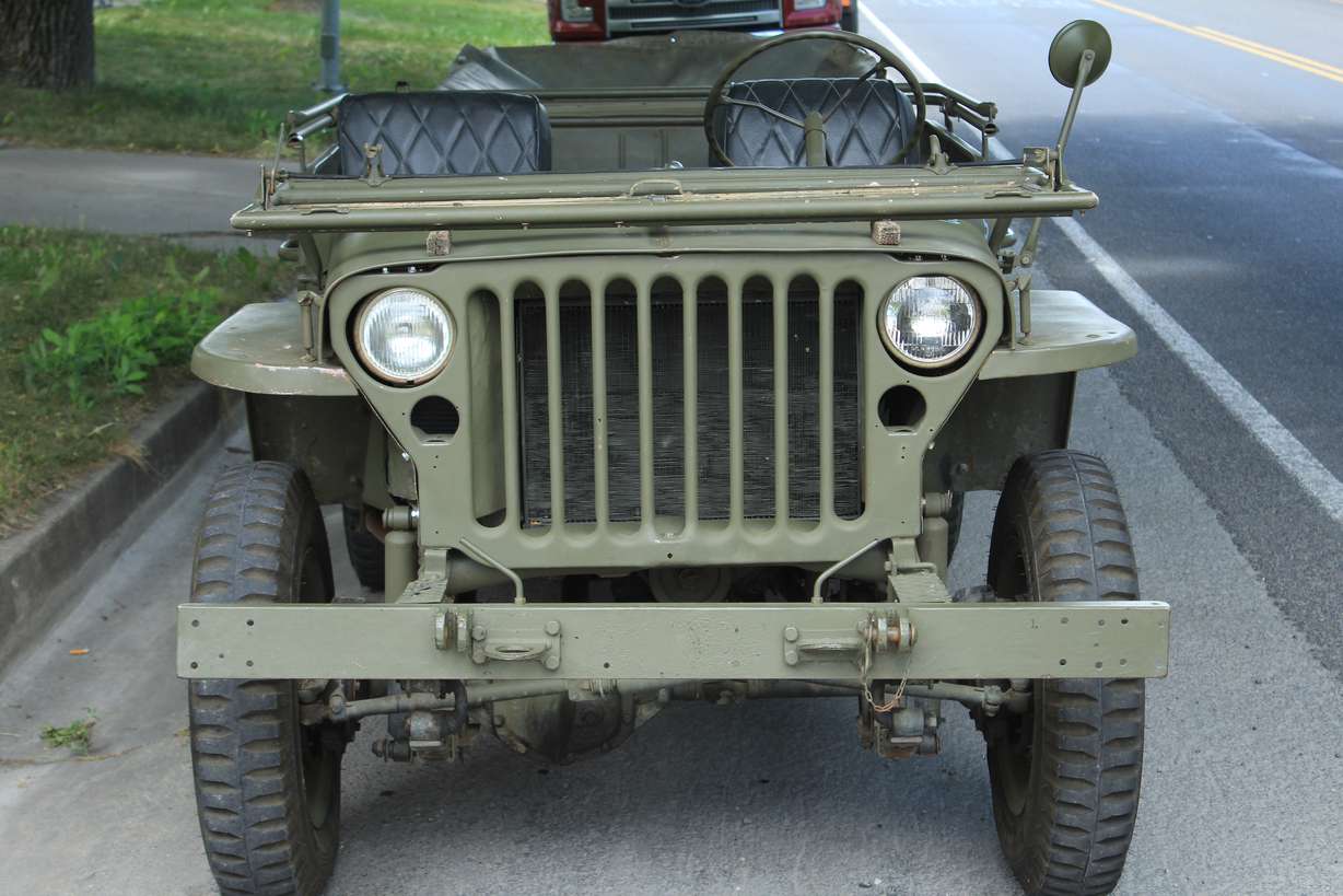 Traditional grill of Tate Christensen’s 1943 Willys MB Army Jeep, restored from former military, parks, and farm duty.