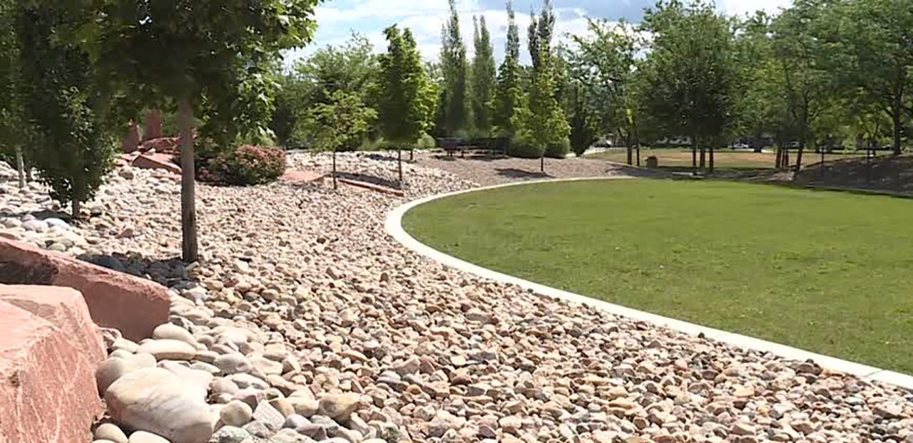 Two and 1/2 acres of thirsty turf at Salt Lake Community College was xeriscaped into a drought-tolerant zone with shade trees, rock gardens, and sitting areas.