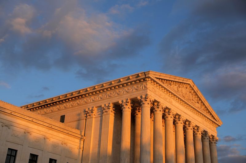 Light from the sunset shines on the United States Supreme Court Building in Washington, D.C., U.S., May 13, 2021. The U.S. Supreme Court on Friday declined to hear an appeal by a florist fined by Washington state for refusing to make a flower arrangement for a same-sex wedding due to her Christian beliefs, sidestepping another major case pitting gay rights against religious liberty.