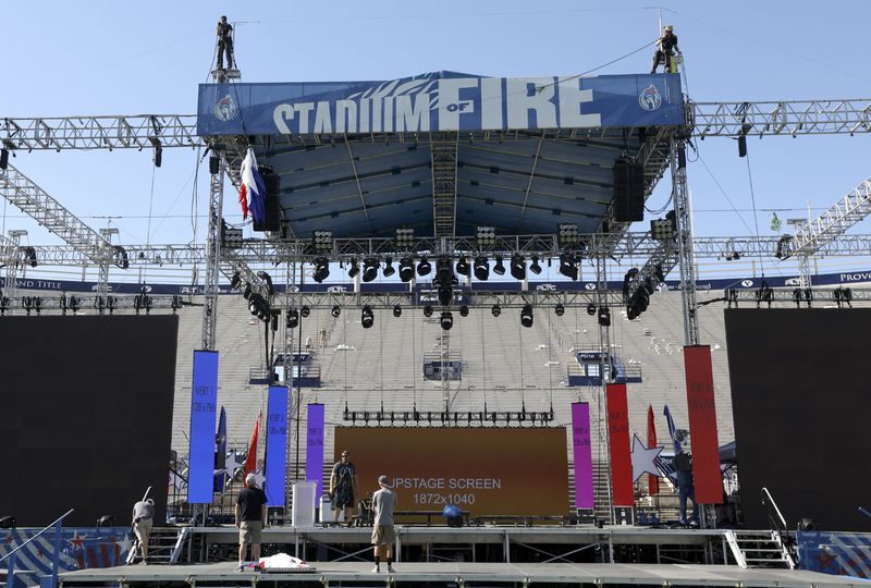 Production Services International riggers hang
inflatable stars while setting up for Stadium of Fire at LaVell
Edwards Stadium in Provo on Friday, July 2, 2021.