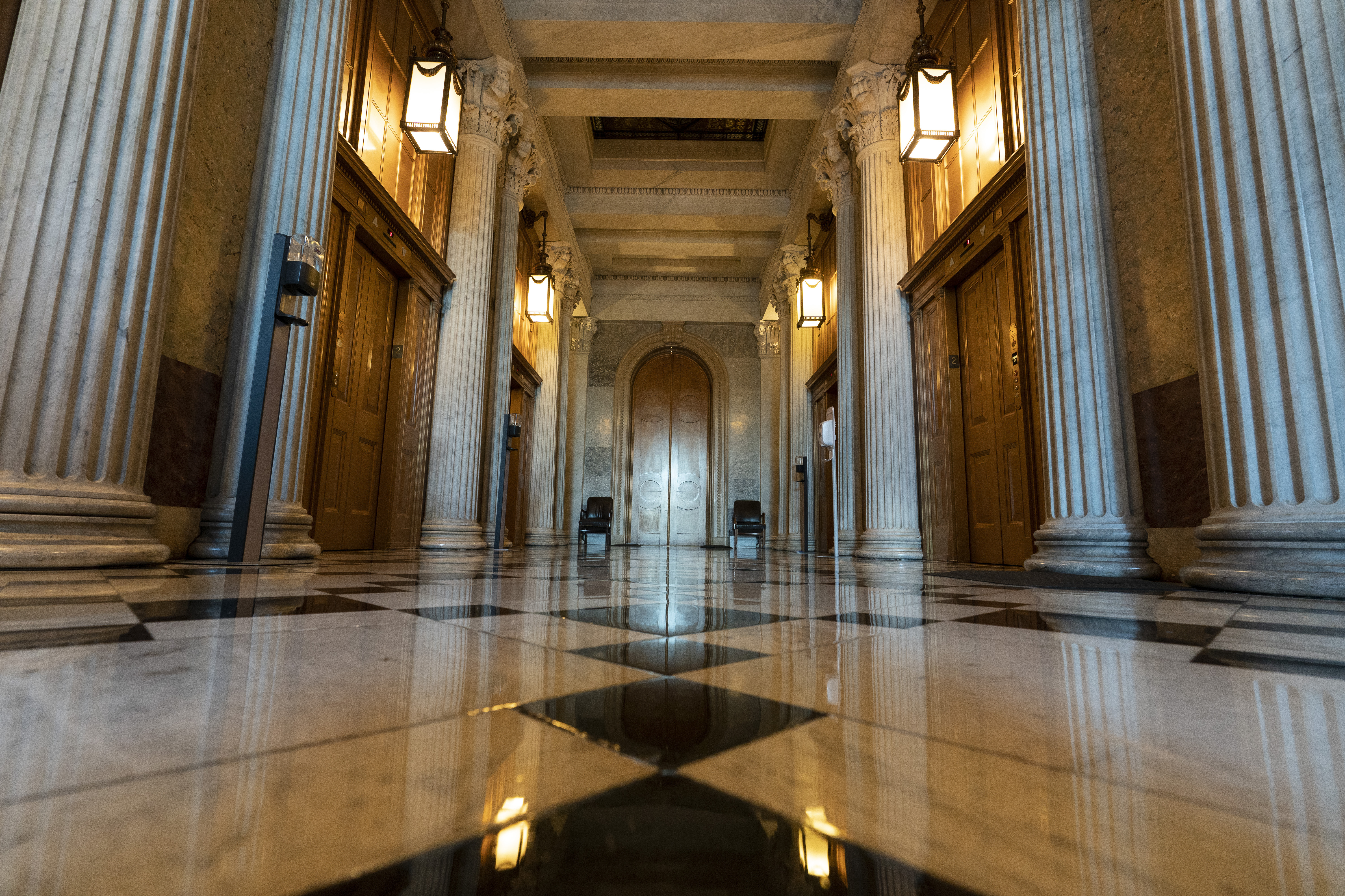 This June 30, 2021, photo shows the halls of the Capitol outside the Senate in Washington. The U.S. Capitol is still closed to most public visitors. It's the longest stretch ever that the building has been off-limits in its 200-plus year history. 