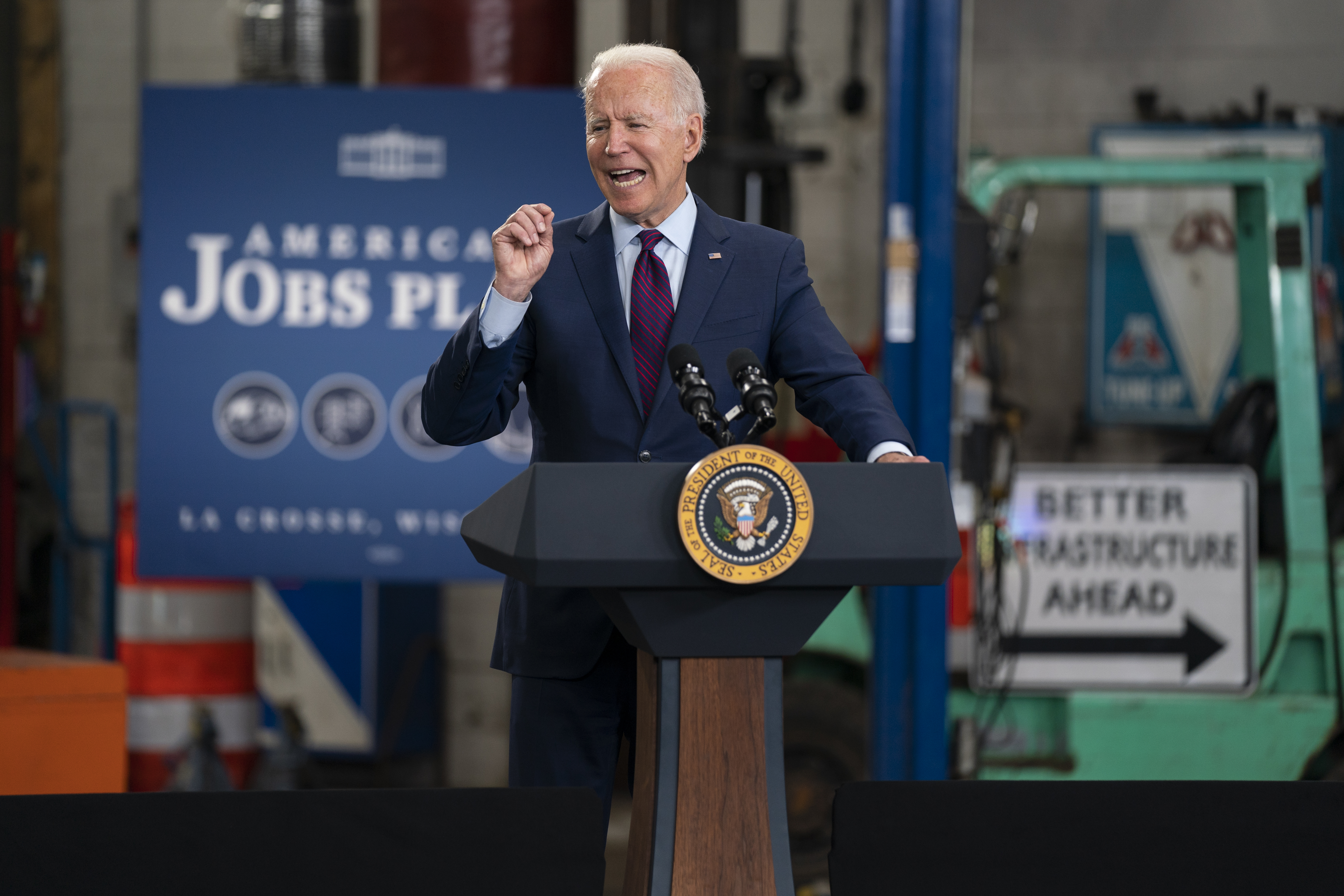 President Joe Biden speaks about infrastructure spending at the La Crosse Municipal Transit Authority on Tuesday, June 29, 2021, in La Crosse, Wis. Climate activists and their Democratic allies in Congress are pressing with renewed urgency for huge investments to slow global warming.