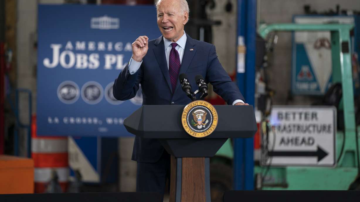 President Joe Biden speaks about infrastructure spending at the La Crosse Municipal Transit Authority on Tuesday, June 29, 2021, in La Crosse, Wis. Climate activists and their Democratic allies in Congress are pressing with renewed urgency for huge investments to slow global warming.