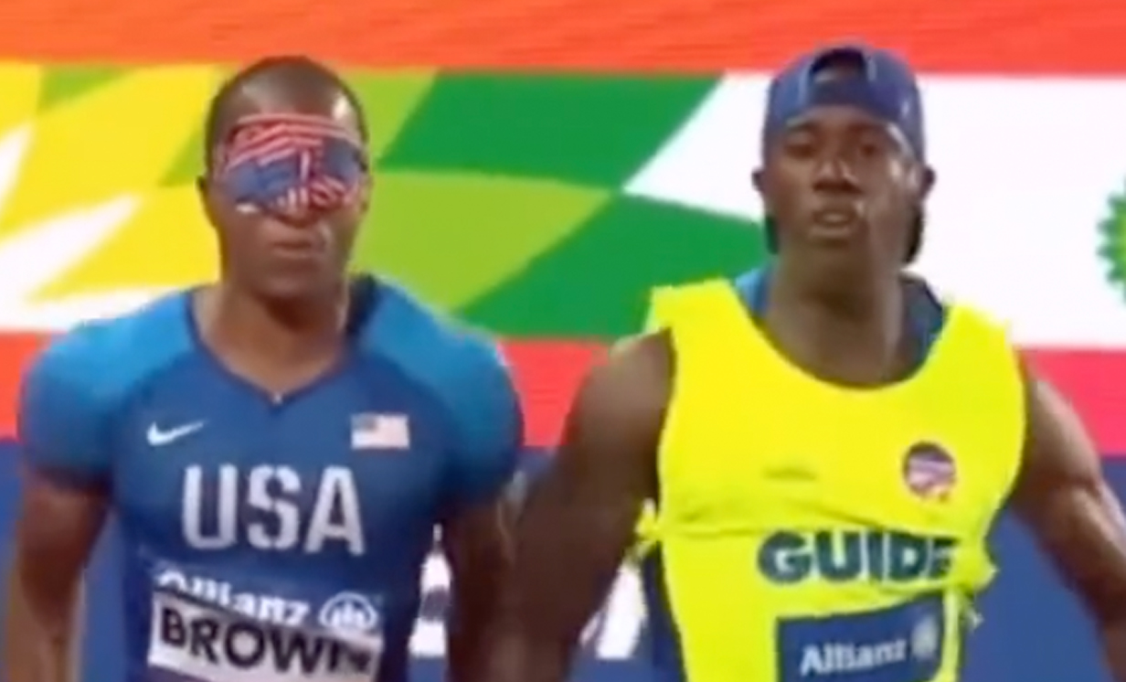 Blind Paralympics sprinter David Brown, left, is seen competing in an event with his sighted guide Jerome Avery in this undated photo. 