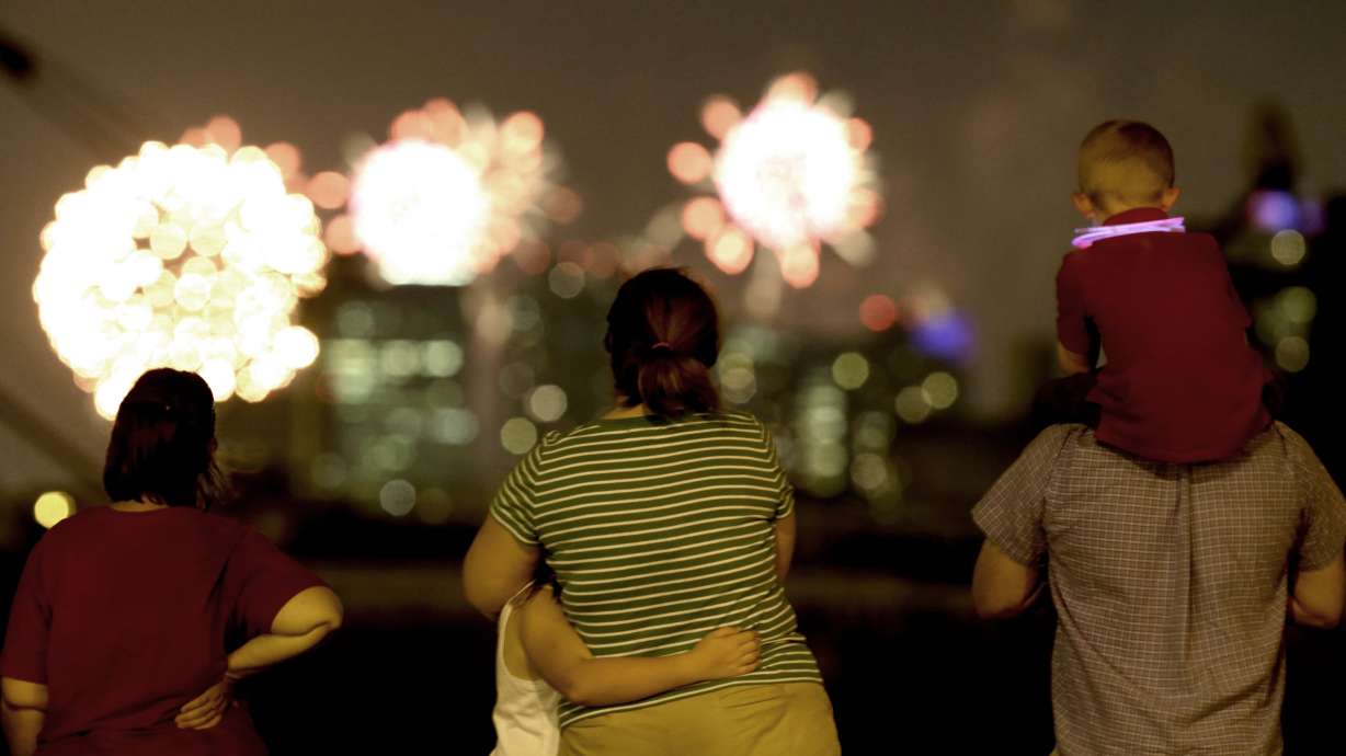 Spectators watch fireworks light up the sky during the annual Macy's Fourth of July fireworks display over the Hudson River as seen from Bayonne, N.J., Wednesday, July 4, 2012. Researchers have found that playing with children can offset anxiety and help cope with stress and improve our overall well-being.
