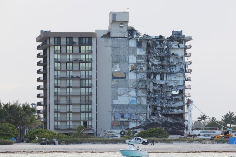 View of the partially collapsed residential building as rescue operations are stopped in Surfside, Florida, on July 4, 2021.