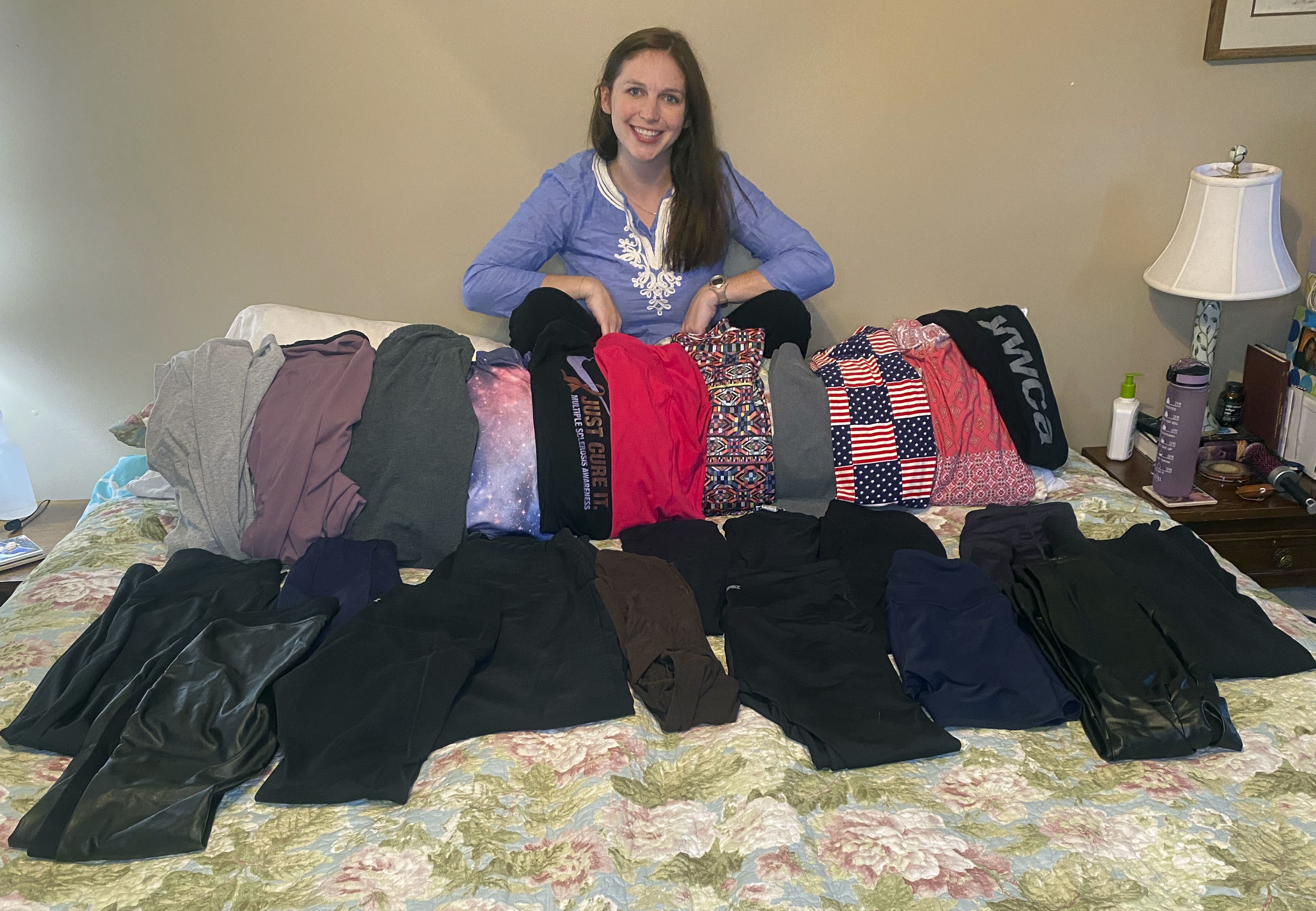 This photo shows Cameron Howe at home in Lynchburg, Va., on June 28, 2021, with her collection of leggings purchased during the pandemic.