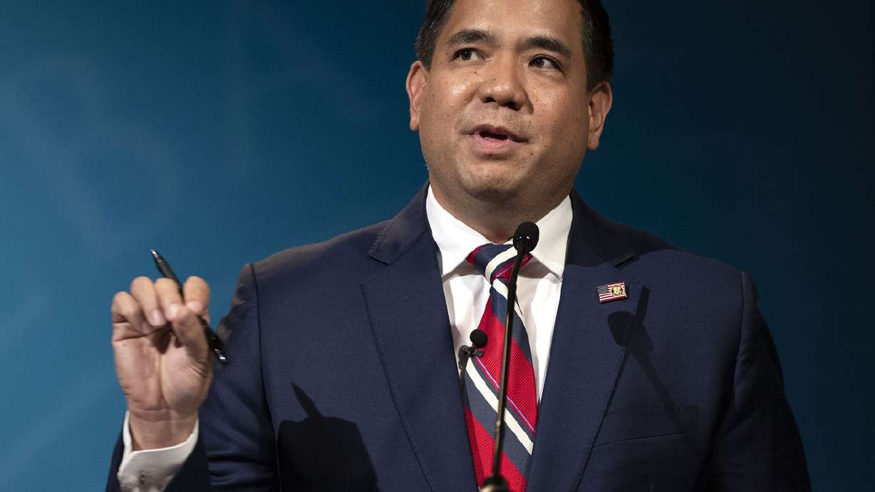 GOP Utah Attorney General Sean Reyes answers a question as he debates defense attorney Greg Skordas, a Democrat,
in the KSL studios in Salt Lake City on Wednesday, Oct. 21, 2020.
