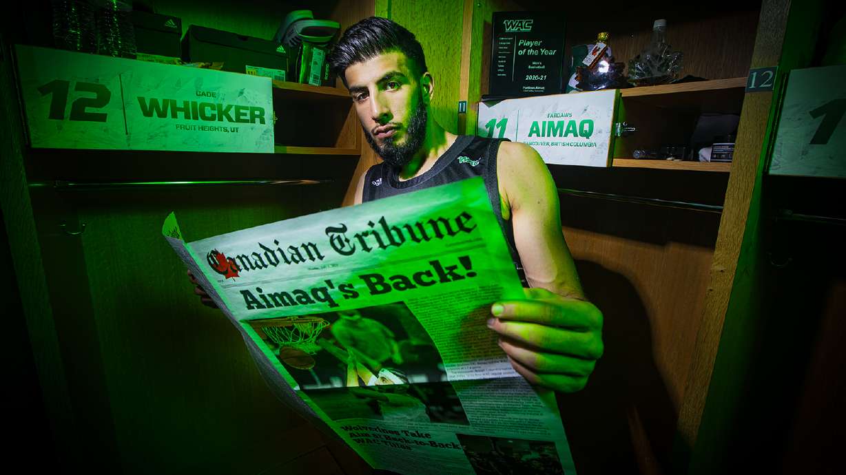 Utah Valley University center Fardaws Aimaq poses for a portrait in the men's basketball locker room on the campus of UVU in Orem, Utah, on Wednesday, June 30, 2021. A redshirt sophomore, Aimaq is pulling out of the NBA Draft to play another year as a Wolverine.
