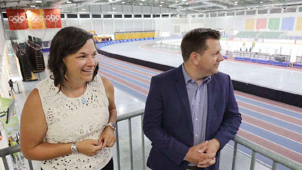 Catherine Raney Norman, chairwoman of the Salt Lake City-Utah Committee of the Games, and Steve Starks,
committee vice chairman and Olympic adviser to Gov. Spencer Cox, look over the Utah Olympic Oval in Kearns on Thursday, June 17, 2021.