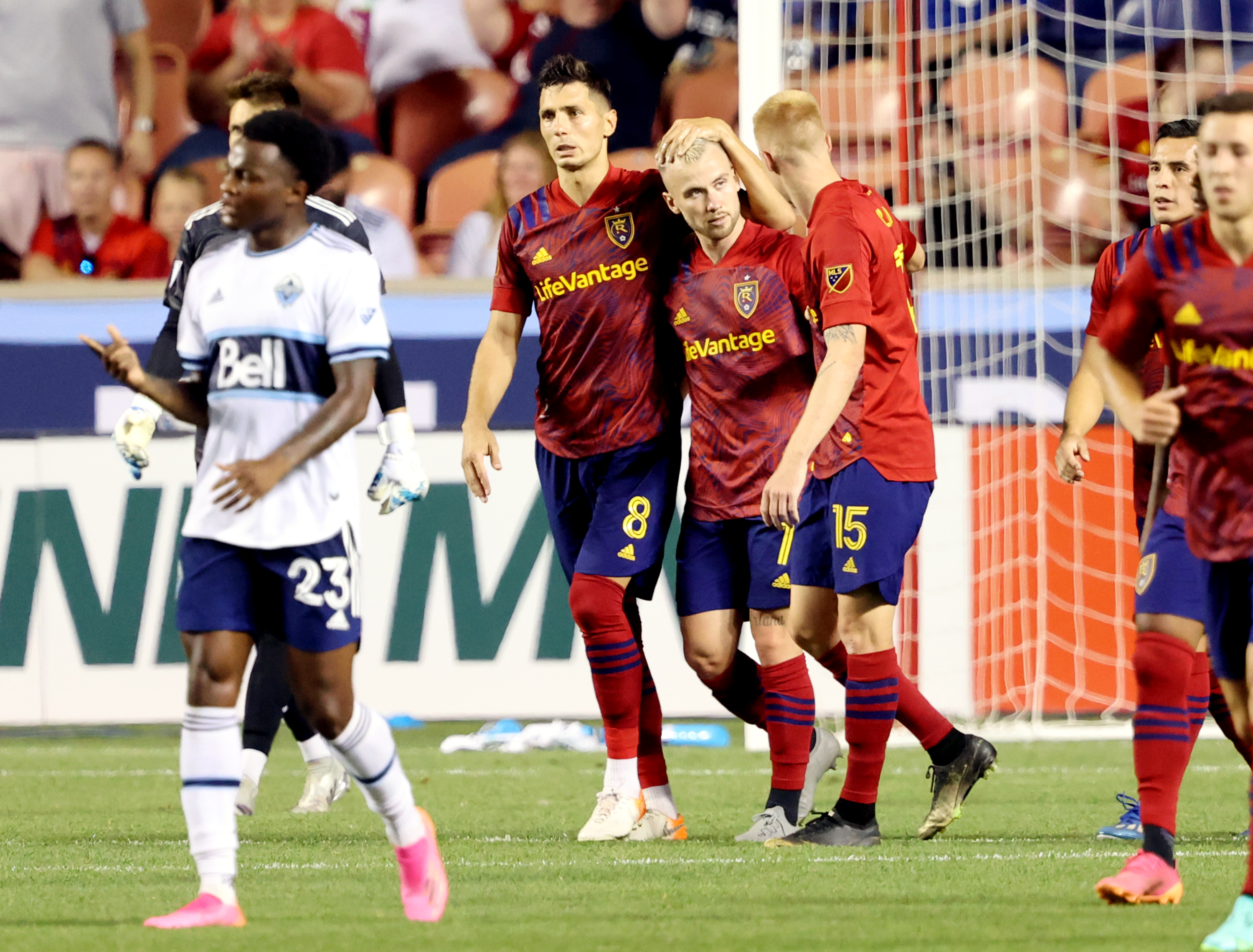 Real Salt Lake midfielder Albert Rusnak (11) celebrates a penalty kick score with teammates Real Salt Lake midfielder Damir Kreilach (8) and Real Salt Lake defender Justen Glad (15) as Real Salt Lake and Vancouver FC play at Rio Tinto Stadium in Sandy on Wednesday, July 7, 2021. RSL won 4-0.