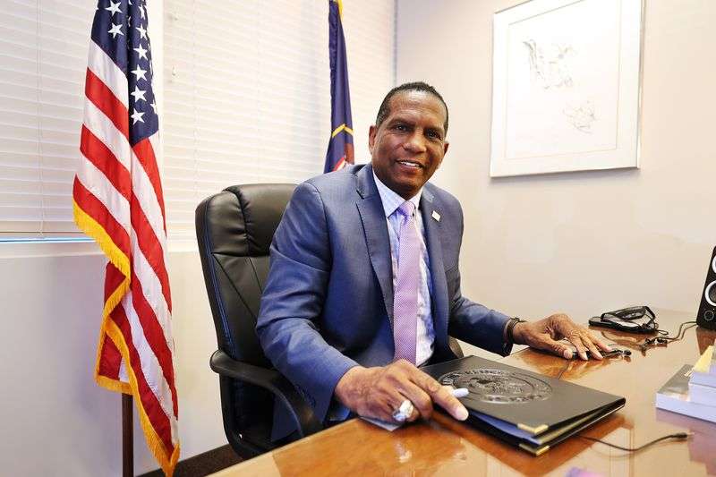 Rep. Burgess Owens, R-Utah, poses for a photograph
following an interview at his West Jordan offices on Monday, April
12, 2021.