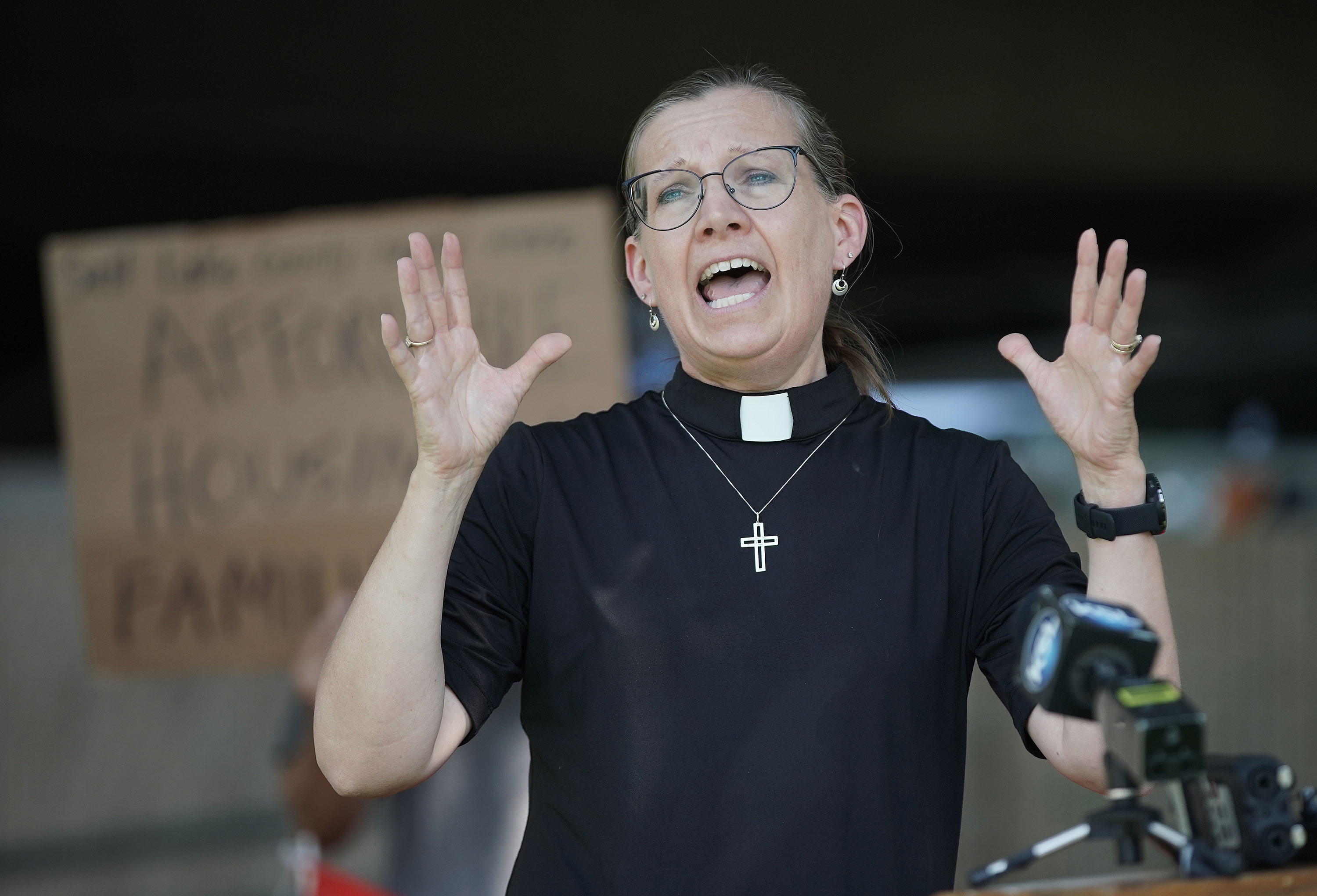 The Rev. Brigette Weier, of Our Saviour's Lutheran Church, speaks as faith leaders urged Salt Lake County government officials to use federal funds for housing to reduce homelessness for families, people with disabilities and senior citizens in Salt Lake City on Thursday, July 8, 2021.