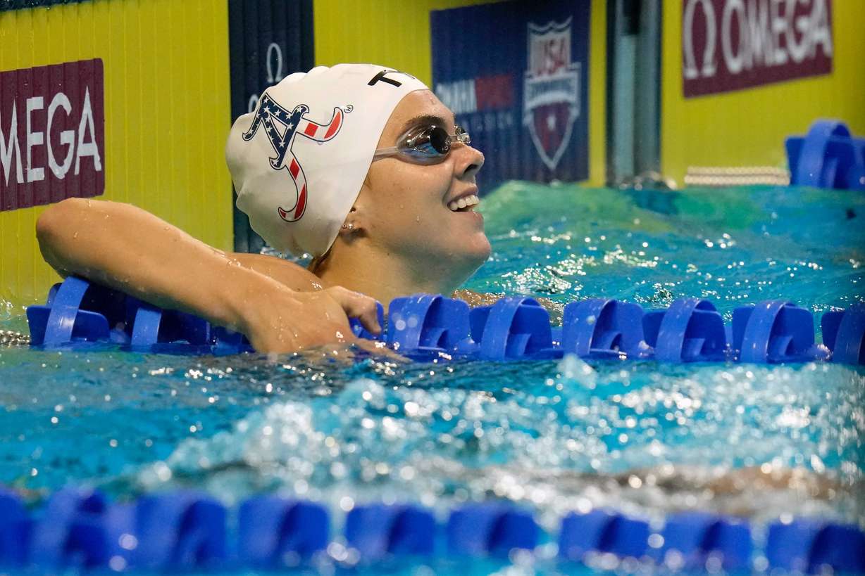 Rhyan White smiles after the women's 200-meter backstroke during wave 2 of the U.S. Olympic Swim Trials on Saturday, June 19, 2021, in Omaha, Neb.