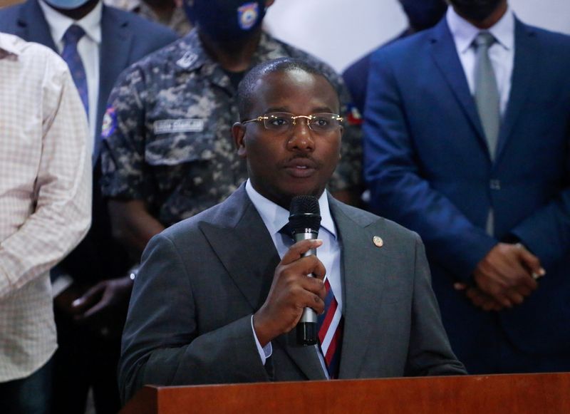 Haiti's interim Prime Minister Claude Joseph addresses the audience after suspects in the assassination of President Jovenel Moise, were shown to the media in Port-au-Prince, Haiti July 8, 2021.