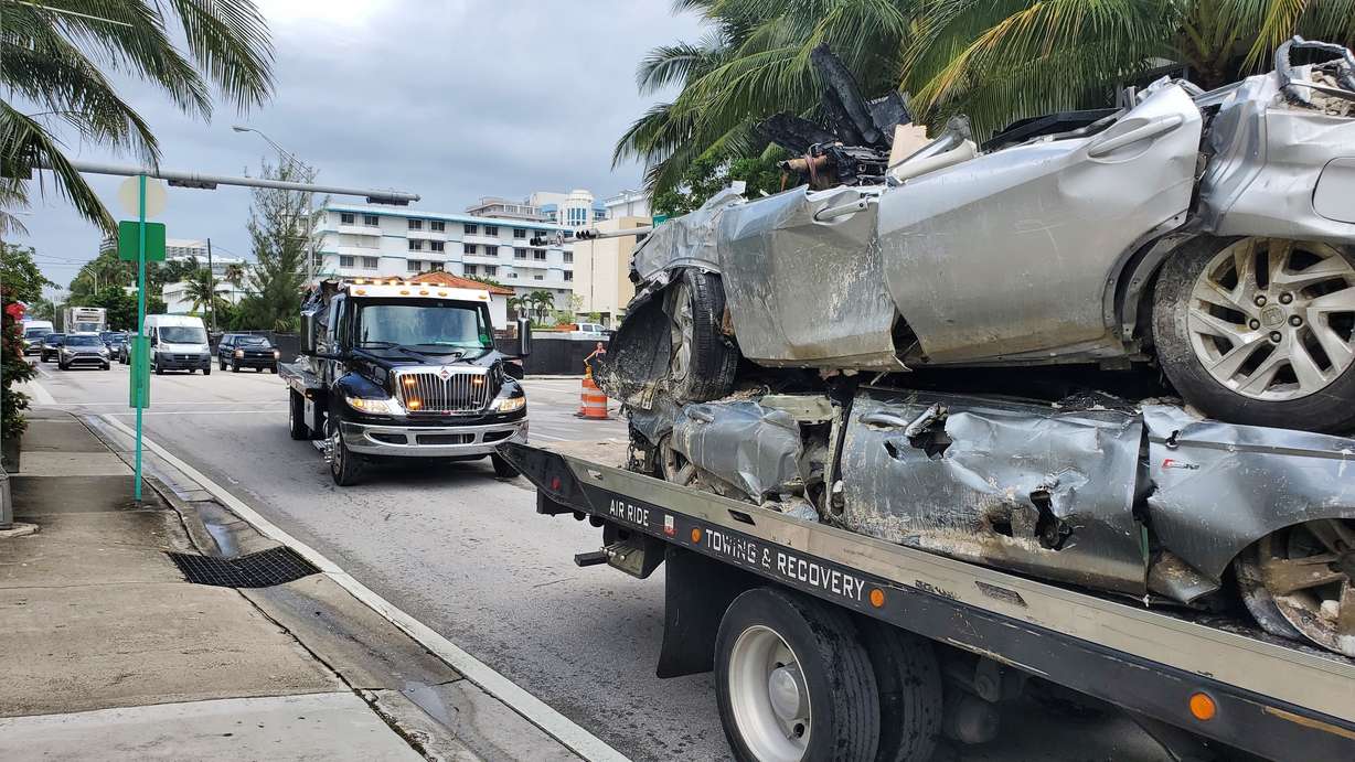 Vehicles that were pulled from the rubble of the Champlain Towers South are transported on Saturday, July 10, 2021 in Surfside, Fla.