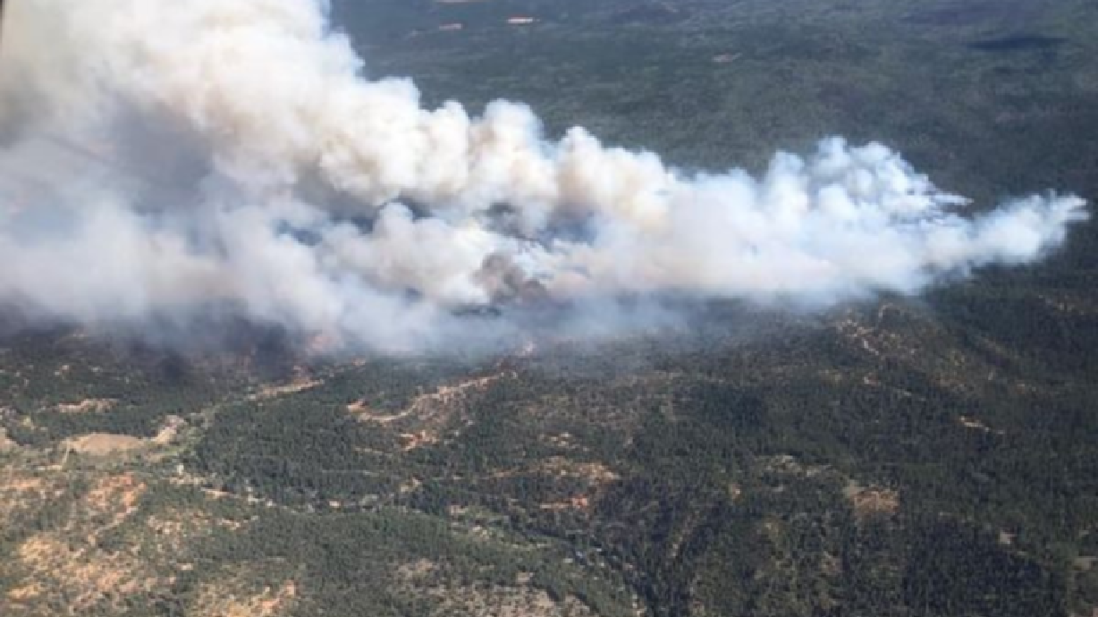 Smoke billows from the Mammoth Creek wildfire burning near Cedar City, Utah.