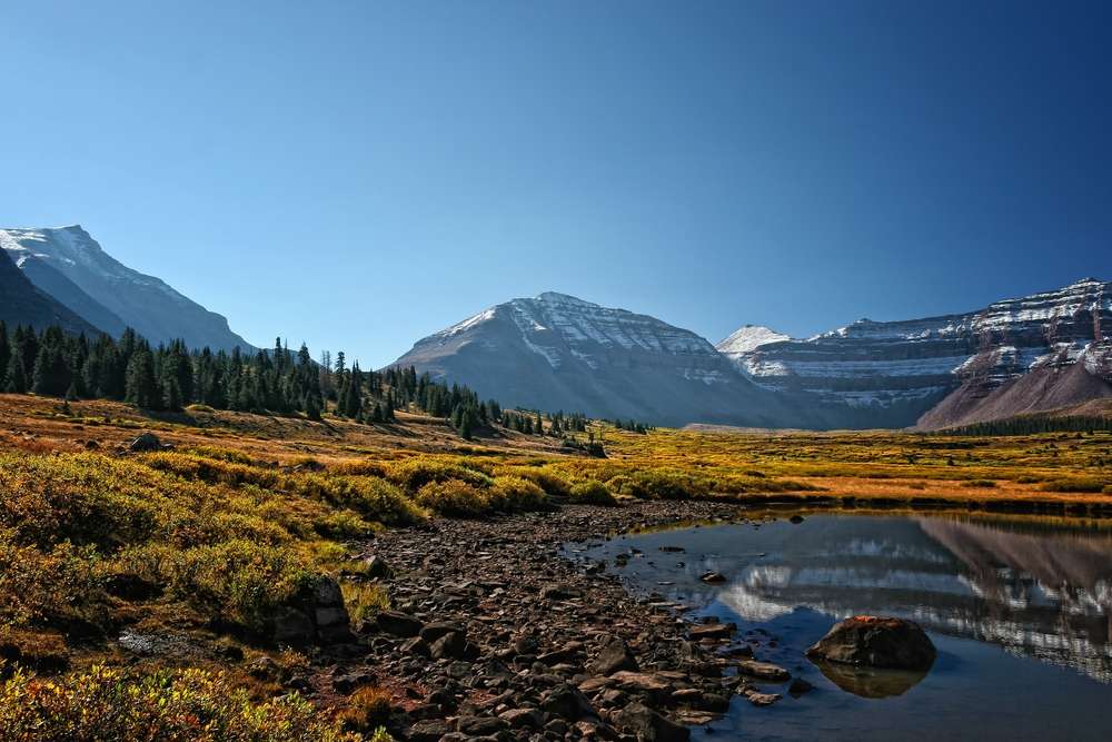 Behind the alpine lake is Kings Peak, Utah's tallest mountain.