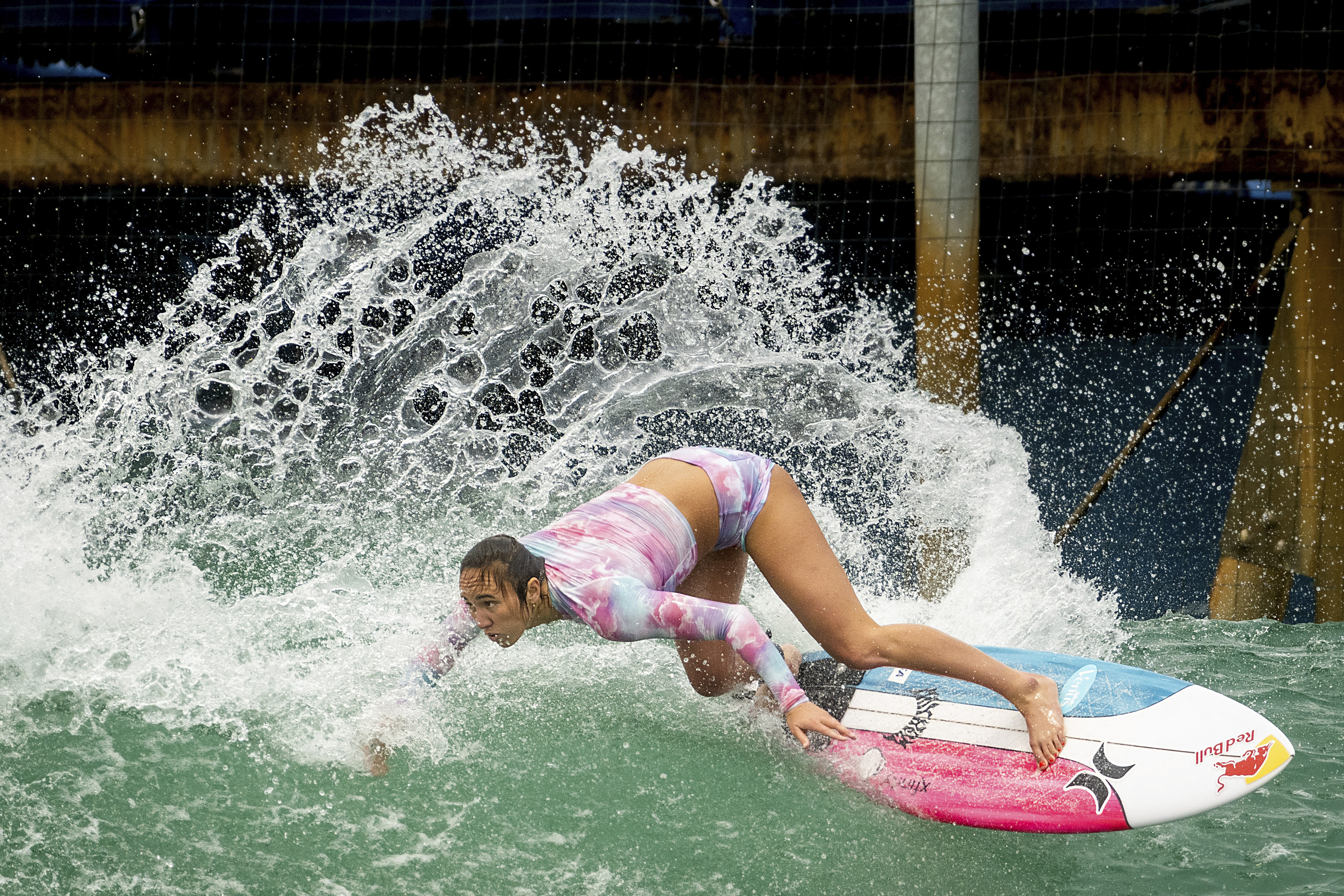 Carissa Moore of the United States, practices for a World Surf League competition at Surf Ranch on Wednesday, June 16, 2021, in Lemoore, Calif. The Summer Games in Tokyo, which kick off this month, serve as a proxy for that unresolved tension and resentment, according to the Native Hawaiians who lament that surfing and their identity have been culturally appropriated by white outsiders who now stand to benefit the most from the $10 billion industry.