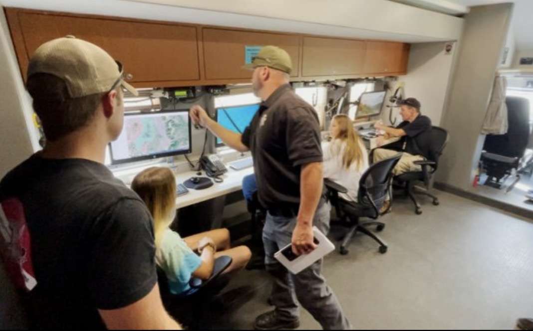Campers get a look inside the Utah County Sheriff's Command Center, in Spanish Fork, Tuesday, July 13, 2021.