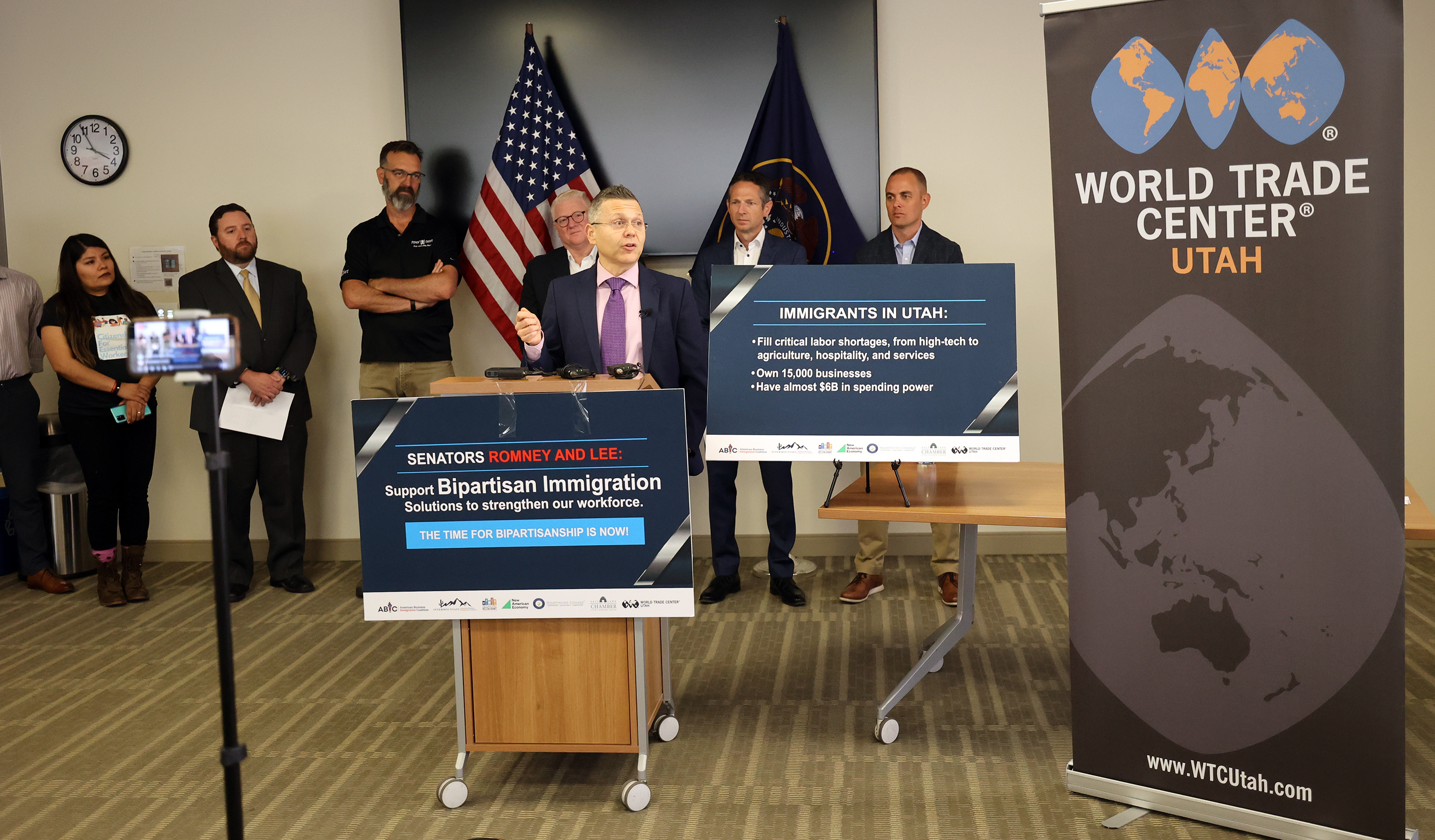 Mikhail Shneyder, president and CEO of Nightingale College, joins a group calling on Utah’s senators to support bipartisan immigration reform during a press conference at the World Trade Center Utah offices in Salt Lake City on Wednesday, July 14, 2021.
