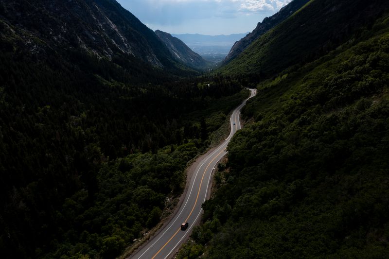 Vehicles drive up and down Little Cottonwood Canyon on
Tuesday, June 29, 2021.