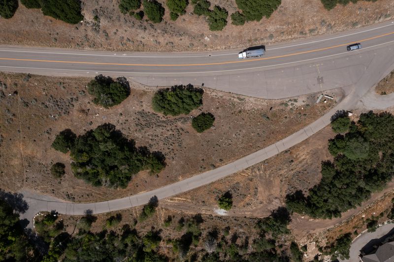 The potential site for the base station of a proposed
gondola, in the center of the image between North Little Cottonwood
Road and a private drive, is pictured at the base of Little
Cottonwood Canyon on Tuesday, June 29, 2021.
