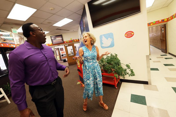 Timothy Gadson, incoming Salt Lake City School District
superintendent, talks with Tracy Sjostrom, principal of Mary W.
Jackson Elementary School, as Gadson tours the school in Salt Lake
City on Tuesday, June 29, 2021. Gadson will take the helm of the
district in July.