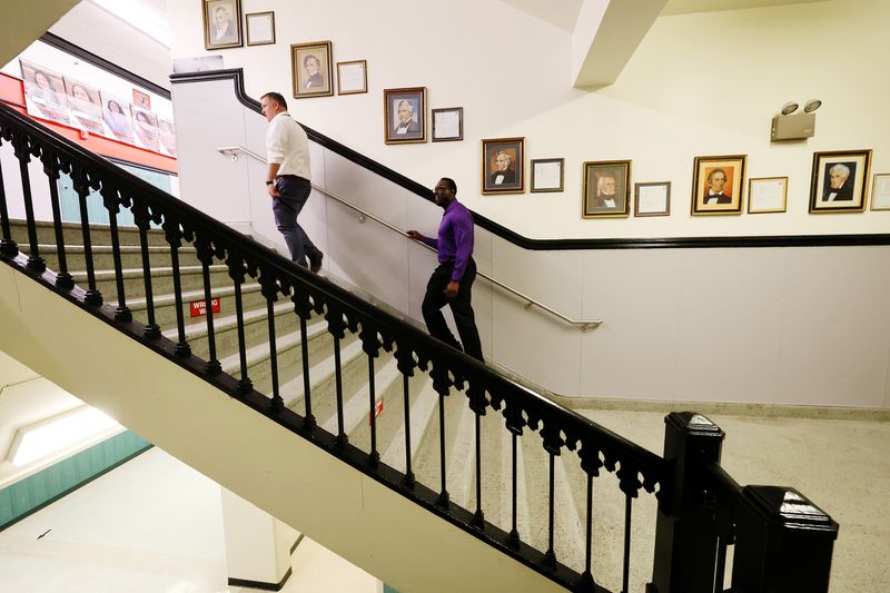 Principal Jared Wright, left, and Timothy Gadson,
incoming Salt Lake City School District superintendent, walk up the
stairs at West High School as Gadson tours the school in Salt Lake
City on Tuesday, June 29, 2021. Gadson will take the helm of the
district in July.