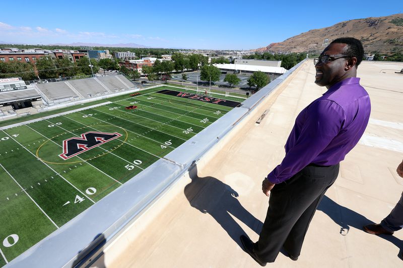 Timothy Gadson, incoming Salt Lake City School District
superintendent, stands on the roof of West High School as he tours
the school in Salt Lake City on Tuesday, June 29, 2021. Gadson will
take the helm of the district in July.