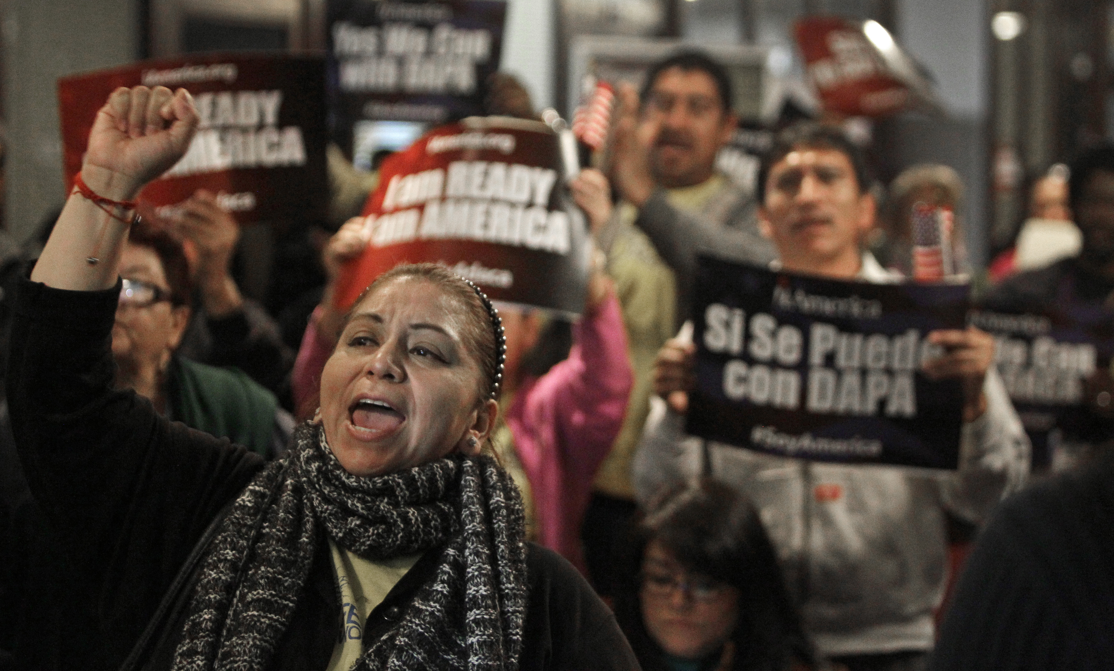 Protesters chant during an event on DACA and DAPA Immigration Relief in Houston on Feb. 17, 2015. A federal judge in Texas on Friday, July 16, 2021, ordered an end to an Obama-era program that prevented the deportations of some immigrants brought into the United States as children.