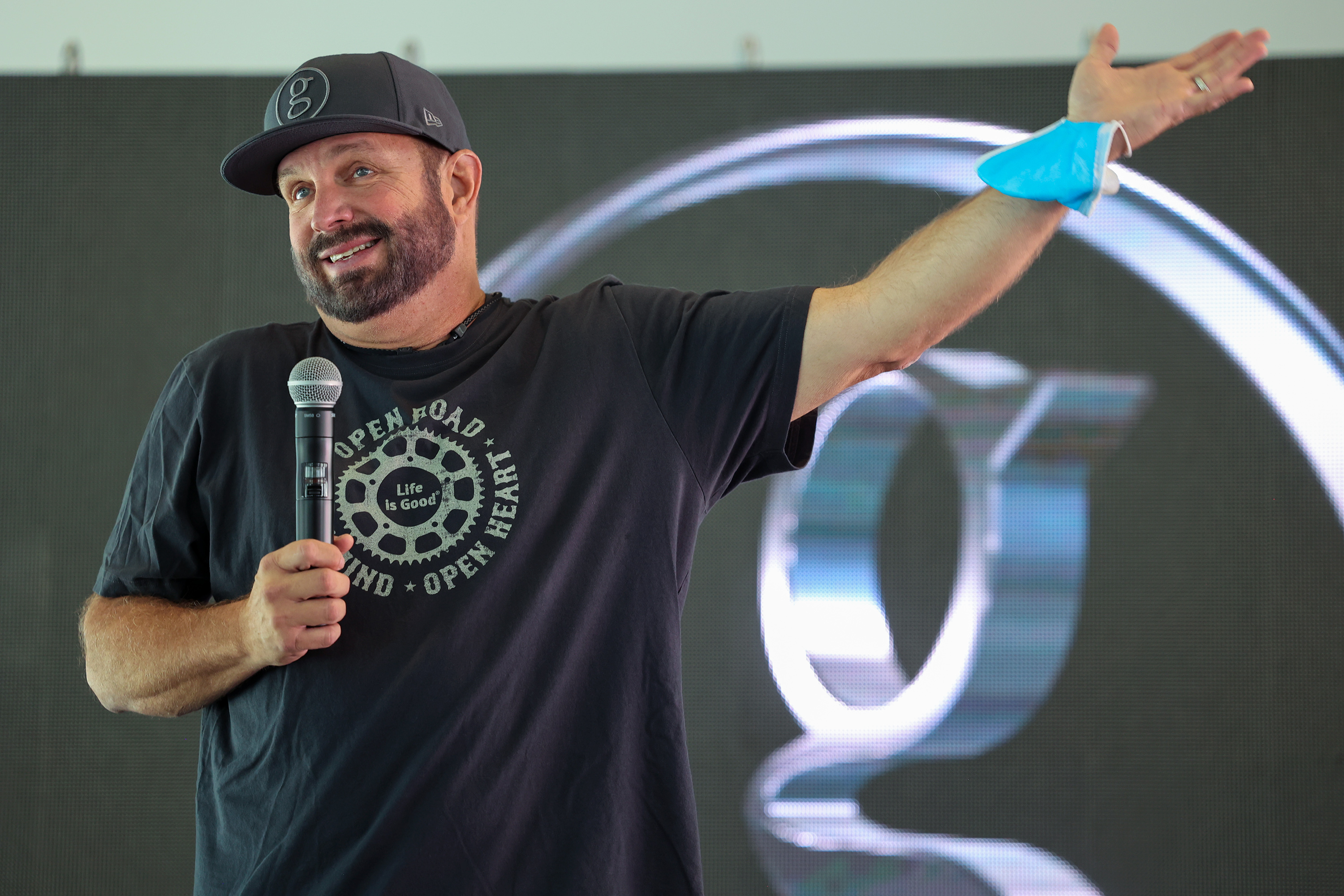 Country music superstar Garth Brooks talks with members of the media during a press conference at the University of Utah's Rice-Eccles Stadium in Salt Lake City on Friday, July 16, 2021.