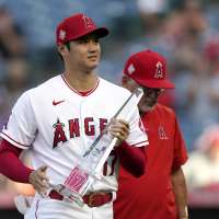 AP source: Ohtani donates HR Derby earnings to Angels' staff