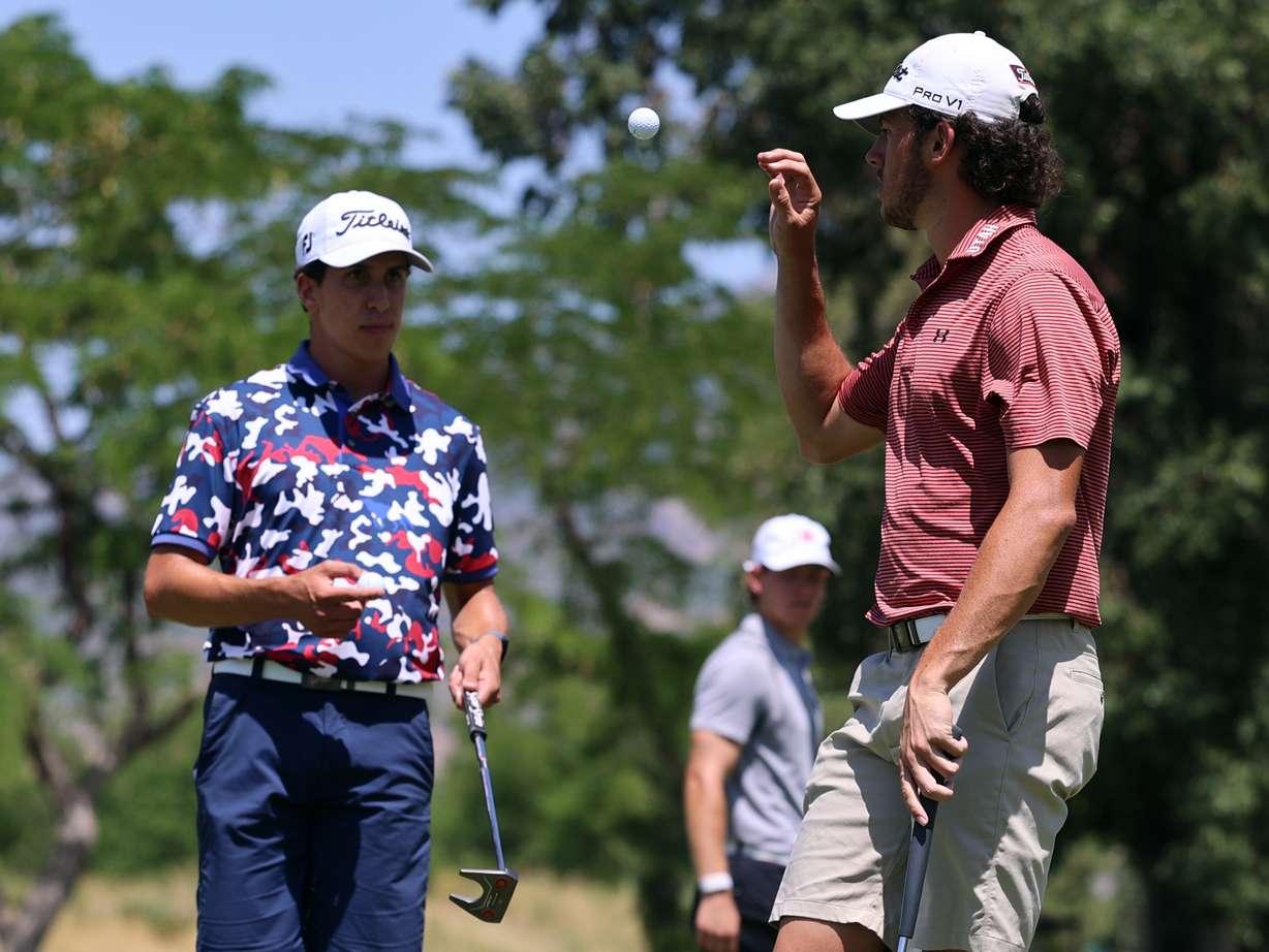 Redshirt freshman Martin Leon, left, bounces University of Utah teammate Blake Tomlinson his ball as they battle each other in the final round of play in the Utah State Amateur at Alpine Country Club on Saturday, July 17, 2021. Leon won the championship in 39 holes.