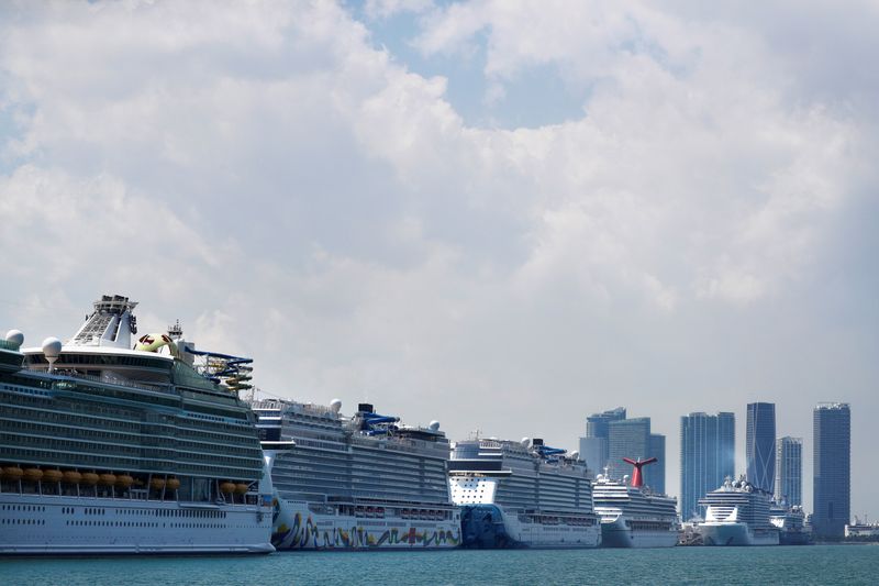 Cruise ships are seen docked at Miami port as the tourism industry is affected by the spread of the coronavirus disease in Miami, Florida, March 26, 2020. On Saturday, July 18, 2021, U.S. appeals court blocks rules that would have suspended CDC cruise ship rules.