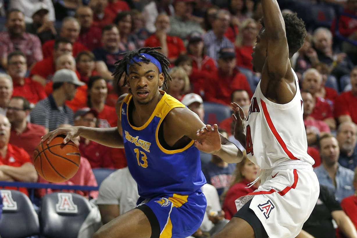 San Jose State guard Seneca Knight (13) in the first half during an NCAA college basketball game against Arizona, Nov. 14, 2019, in Tucson, Ariz.