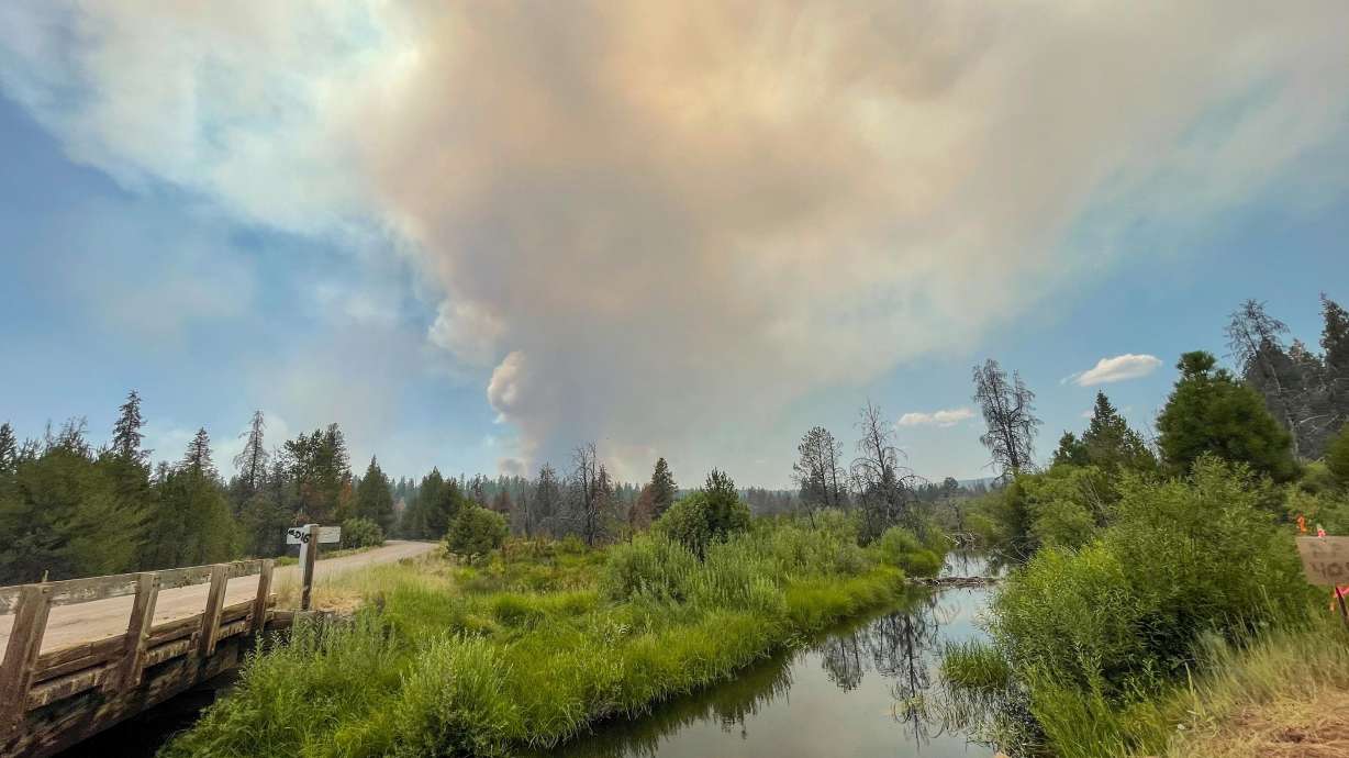 The Bootleg Fire burns in the background behind the Sycan Marsh in southern Oregon on Saturday, July 17, 2021. The destructive Bootleg Fire, one of the largest in modern Oregon history, has already burned more than 476 square miles.
