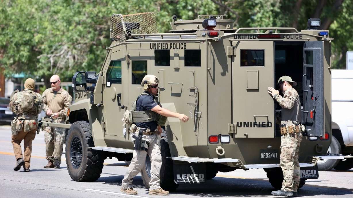 A SWAT team responds to an incident near 800 North and Redwood Road in Salt Lake City on July 20. Salt Lake police on Wednesday released body camera video from the officers who responded to a report of the suicidal man, who allegedly man fired shots at the officers and was later found dead in his apartment.