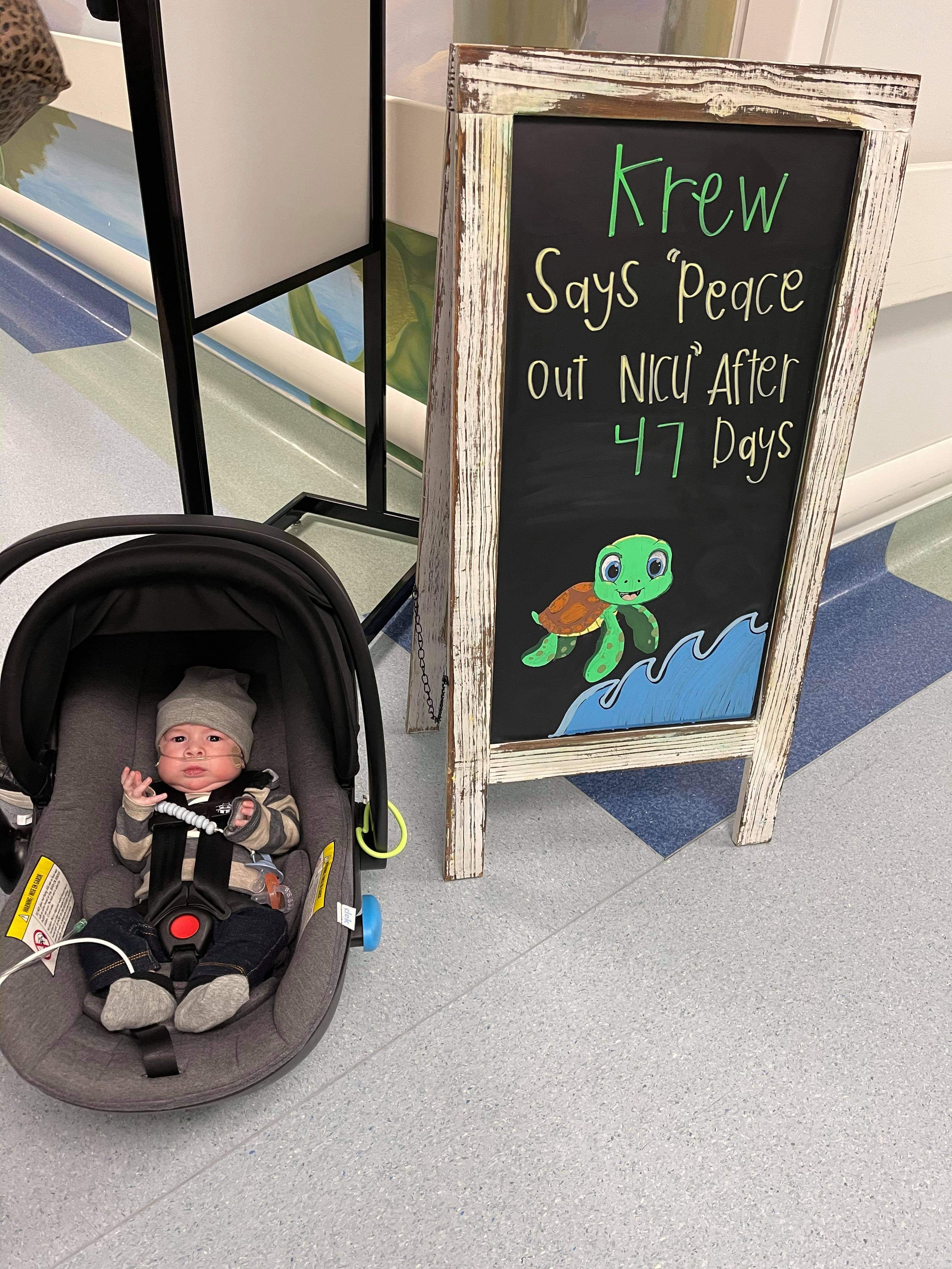 Krew Weick leaves the neonatal intensive care unit at Primary Children's Hospital in Salt Lake City after 47 days of care after birth.