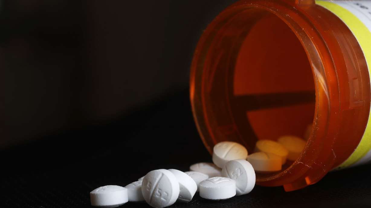 This Aug. 29, 2018, file photo shows an arrangement of Oxycodone pills in New York. A $26 billion settlement between the three biggest U.S. drug distribution companies and drugmaker Johnson & Johnson and thousands of states and municipalities that sued over the toll of the opioid crisis is certainly significant, but it is far from tying a neat bow on the tangle of still unresolved lawsuits surrounding the epidemic.