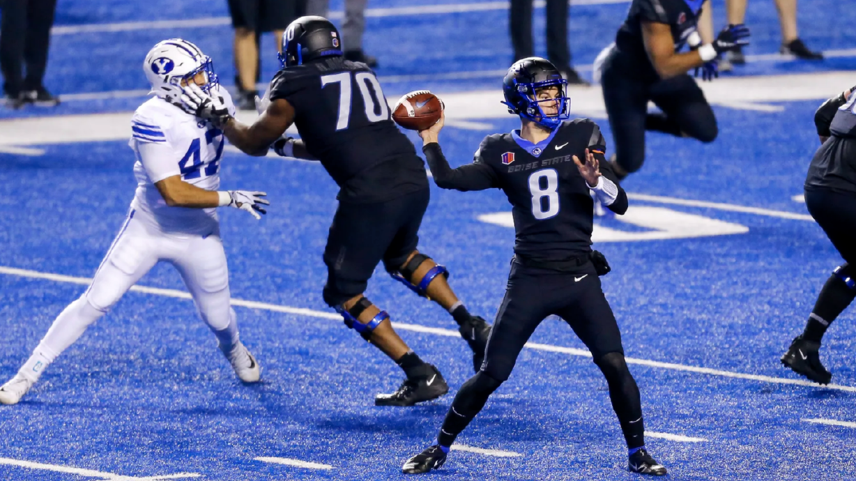 Boise State quarterback Cade Fennegan (8) throws the ball against the BYU defense during the second half in an NCAA college football game Friday, Nov. 6, 2020, in Boise, Idaho. BYU won 51-17. Fennegan announced he is transferring to BYU.