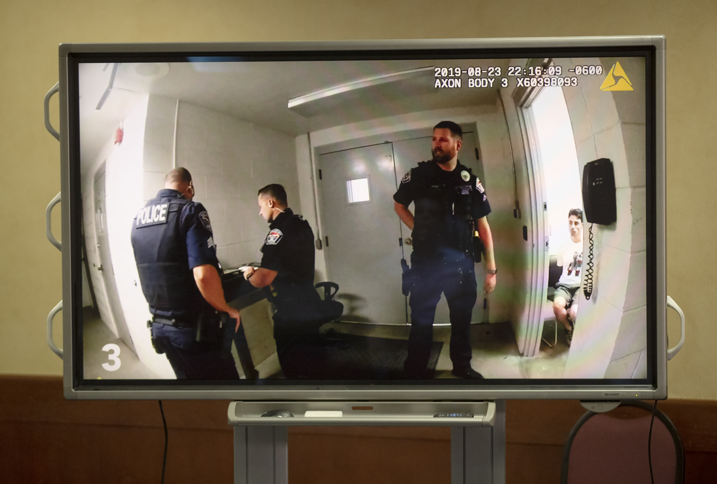 Body camera video of the police shooting of Michael Chad Breinholt is played during a press briefing at West Valley City Hall on Sept. 6, 2019. Breinholt was shot and killed in the DUI processing area on Aug. 23, 2019.