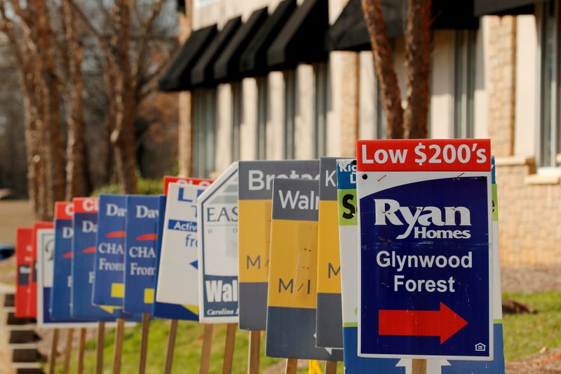 Real estate signs advertise new homes for sale in multiple new developments in York County, South Carolina, February 29, 2020.
