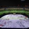 Tokyo Olympics begin with muted ceremony and empty stadium
