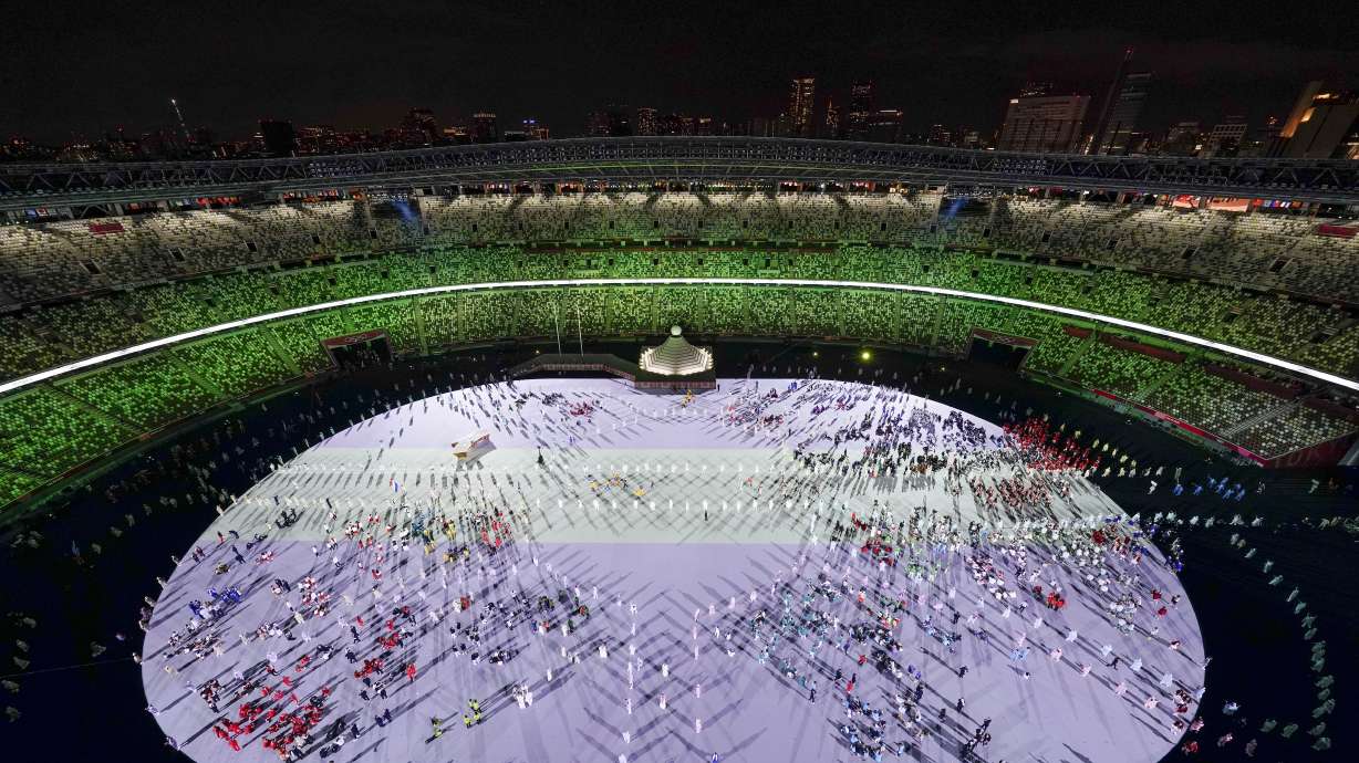 Athletes are introduced during the opening ceremony at the Olympic Stadium at the 2020 Summer Olympics, Friday, July 23, 2021, in Tokyo.