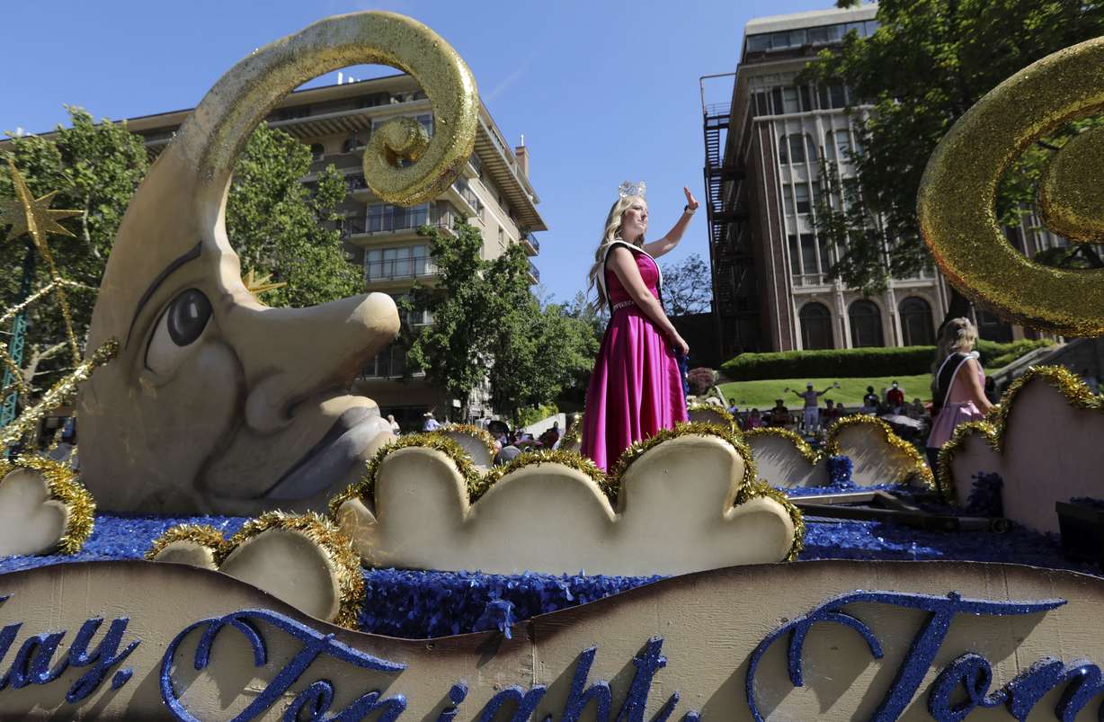Miss Bluffdale waves from the city's float in the Days of ’47 Parade in Salt Lake City on Friday, July 23, 2021. The float won the Ensign Award.