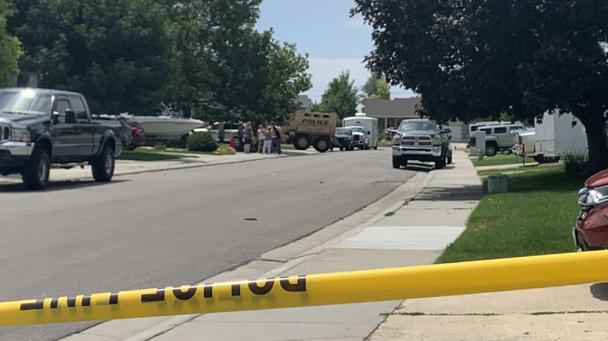 Police arrested a man at Decora Way in West Jordan following a standoff on Friday, July 23, 2021. West Jordan police say Ceasar Eduardo Aguilar, 20, stabbed another man before barricading himself inside a home on the block.