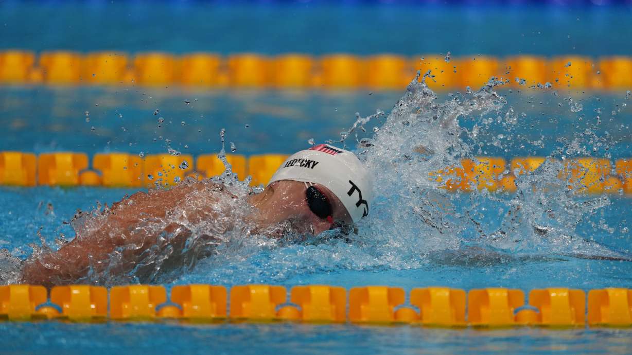 Katie Ledecky, of the United States, swims in a heat during the women's 400-meter freestyle at the 2020 Summer Olympics, Sunday, July 25, 2021, in Tokyo, Japan.